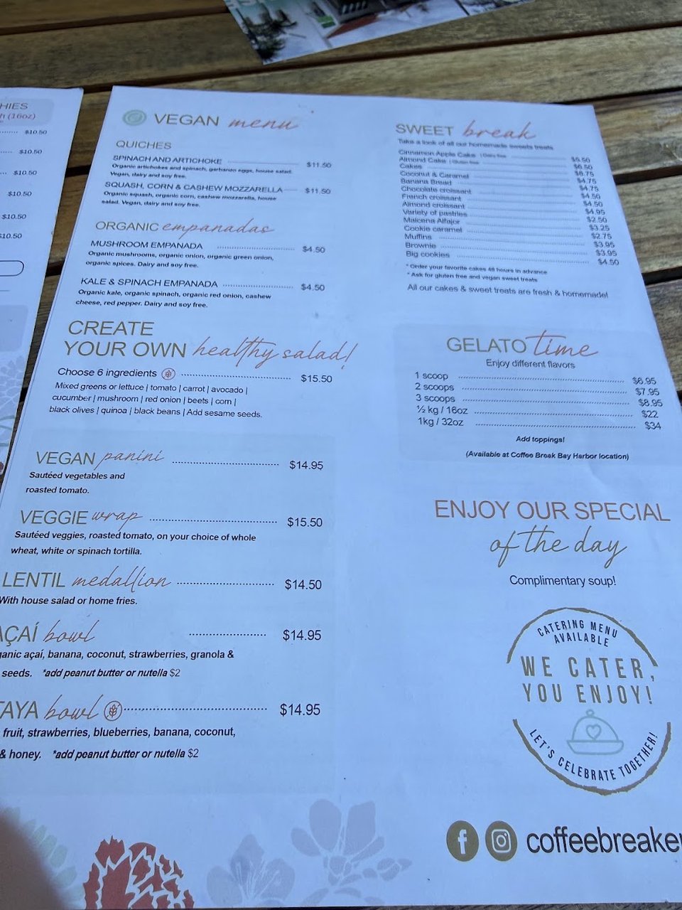 Coffee menu beside a dessert item.